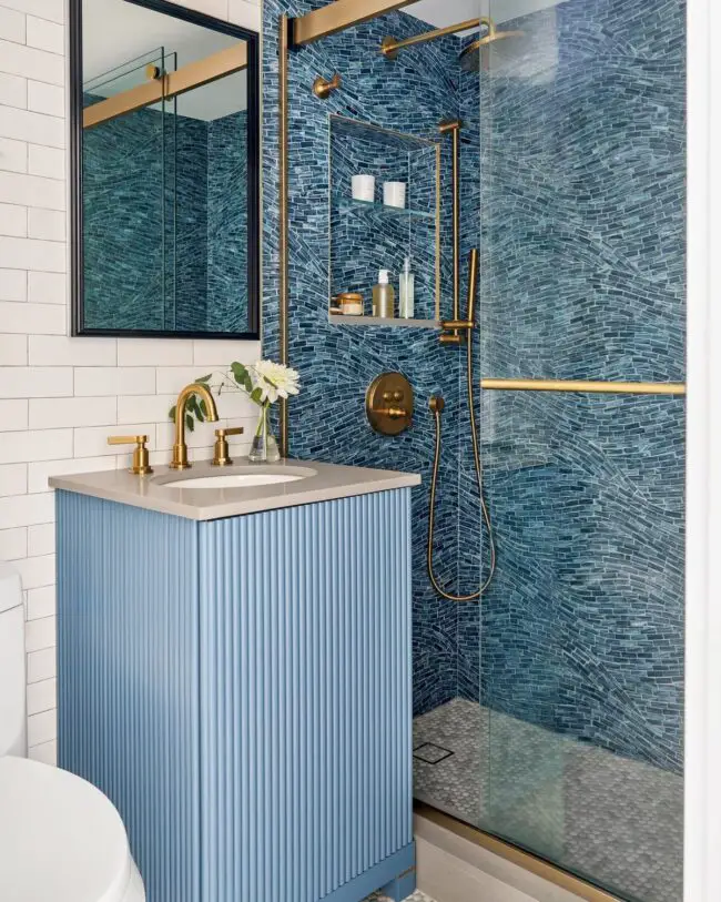 Mosaic Tiles Paired with Bold Blue Vanity