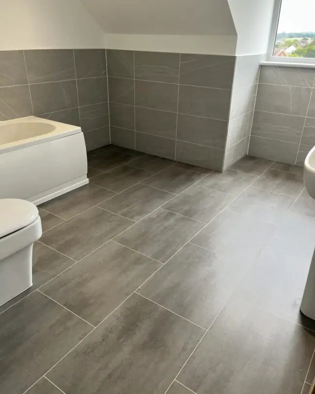 Minimalist Charm with Expansive Gray Tiles