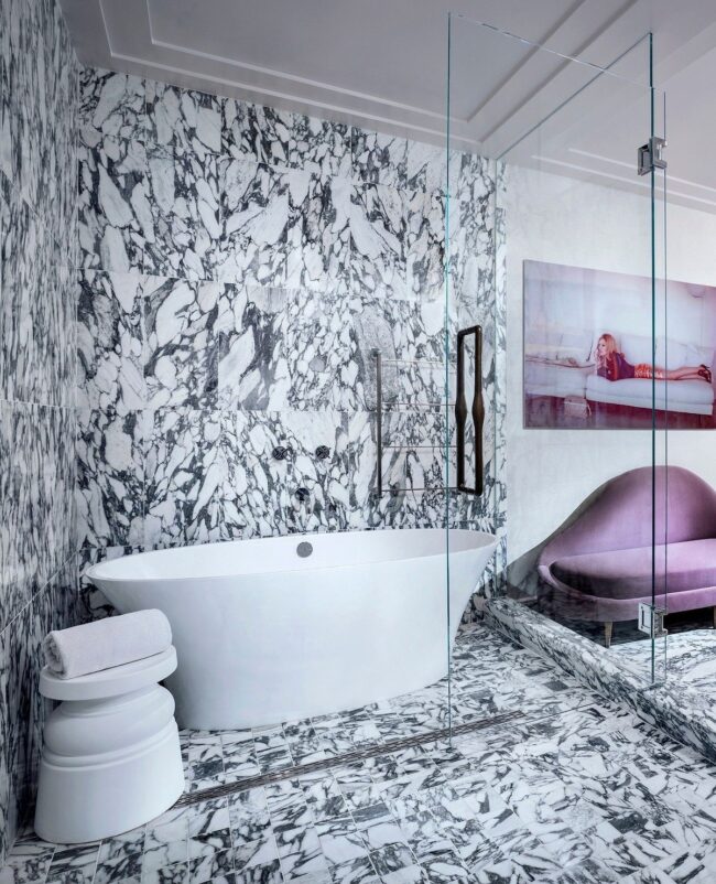 Purple Accents in Marble Bathrooms