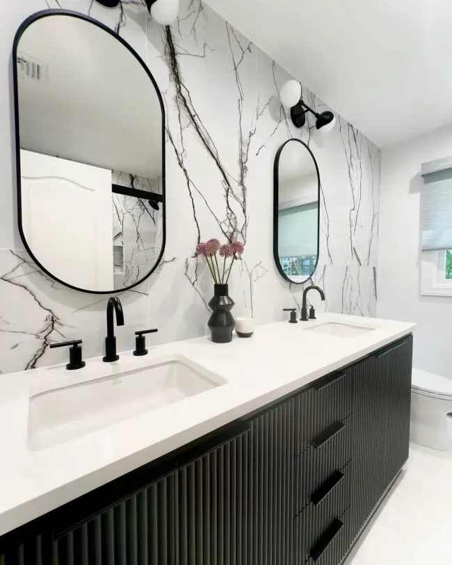 Sleek Vanity with a Marble Accent Wall