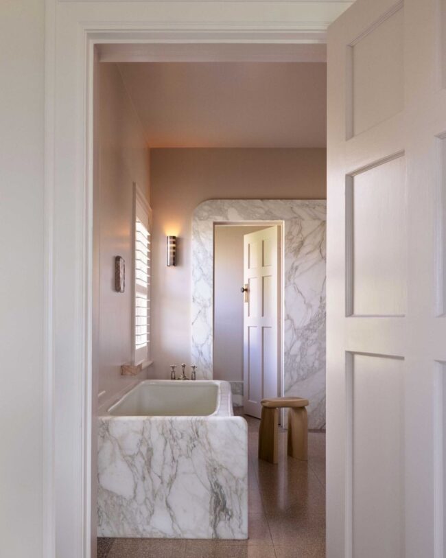 Marble Pink Bathtub with Natural Accents