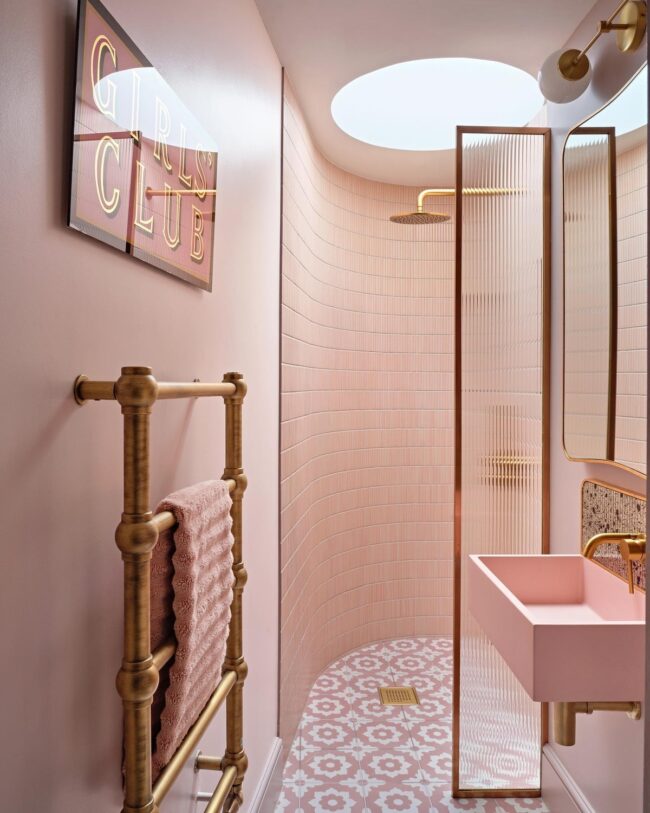 Soft Pink Curved Shower with Feminine Accents