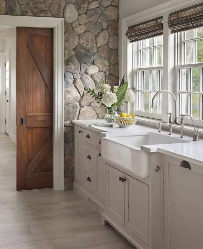 Statement Stone Wall in the Heart of the Kitchen